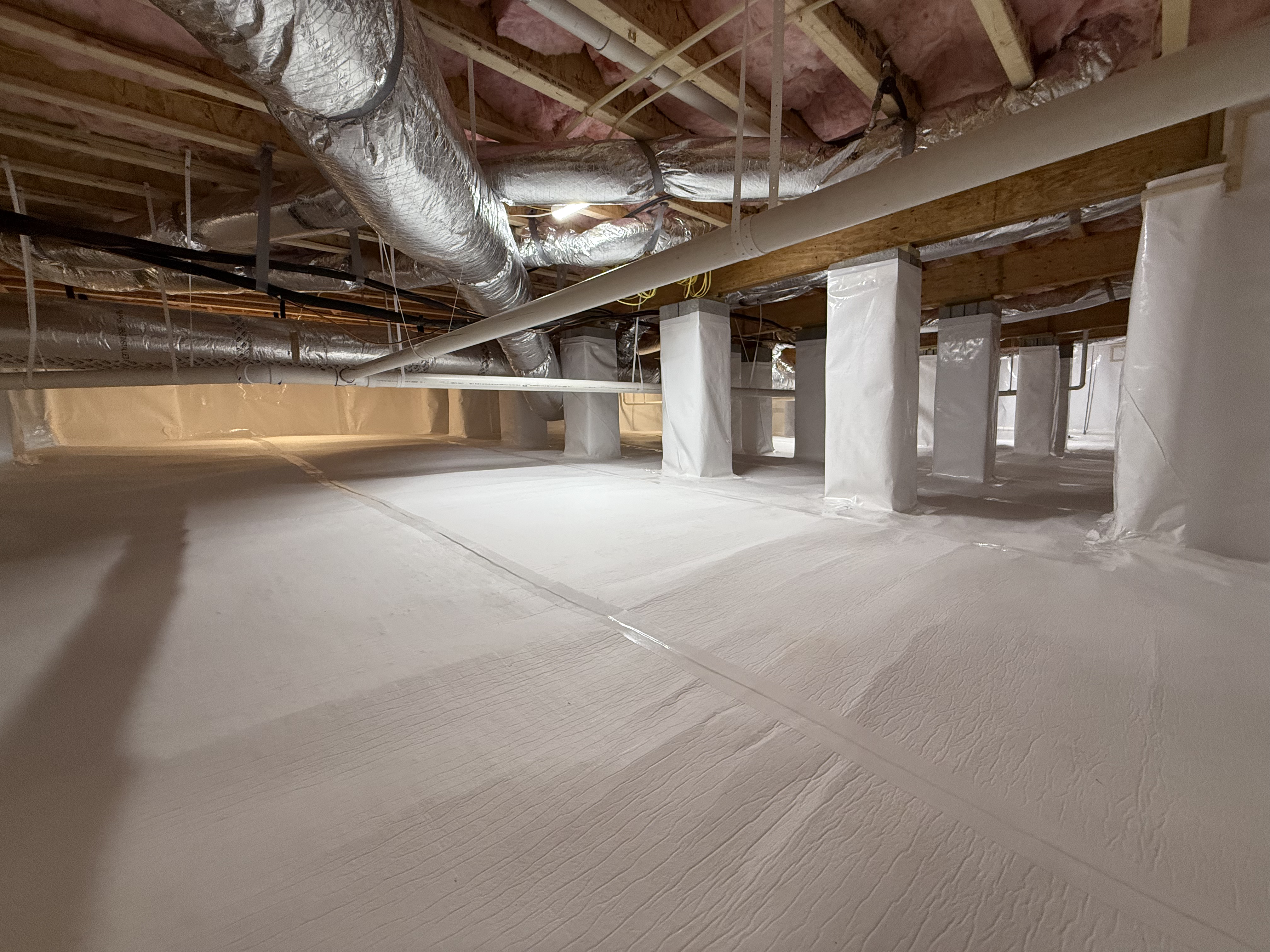 Heavy-duty gray vapor barrier liner and adjustable steel support post installed in Chattanooga crawlspace